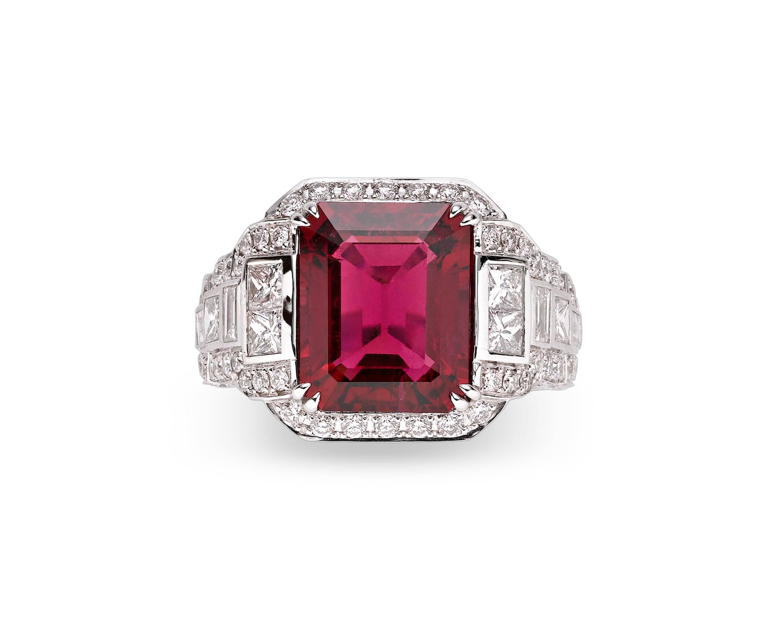 Featuring sparkling diamond encrusted steps and a vibrant rubellite gemstone, this architecturally-inspired, Art Deco-style ring is a true conversation piece. The 5.13 carat rubellite at the ring’s center displays a deep crimson hue that is