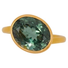 Scrives 5.05 carats Deep Green Tourmaline 22 Karat Gold Ring
