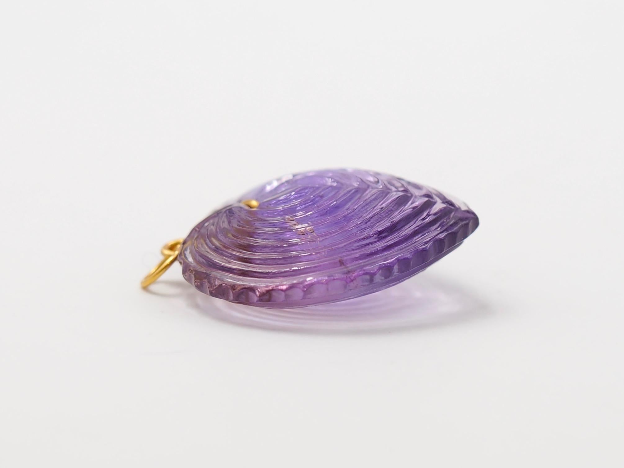 carved amethyst pendant