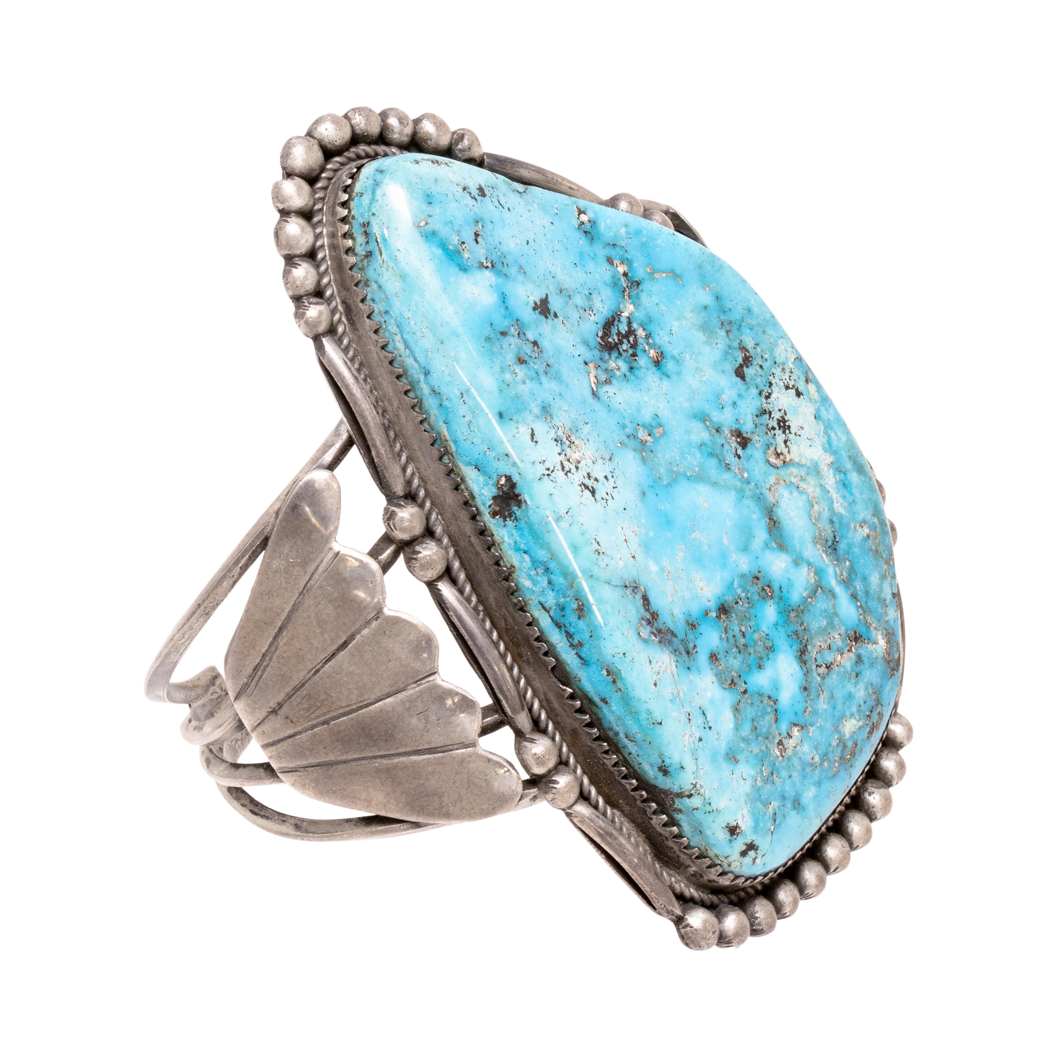 Navajo large turquoise slab bracelet. The turquoise is from the Kingman Mine in Arizona. This bracelet has an exceptionally beautiful sky blue stone (over 2