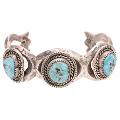 Navajo Turquoise and Sand Cast Silver Bracelet