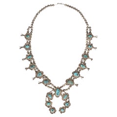Collar vintage de turquesa Navajo de Kingman y plata de ley con diseño de flor de calabaza