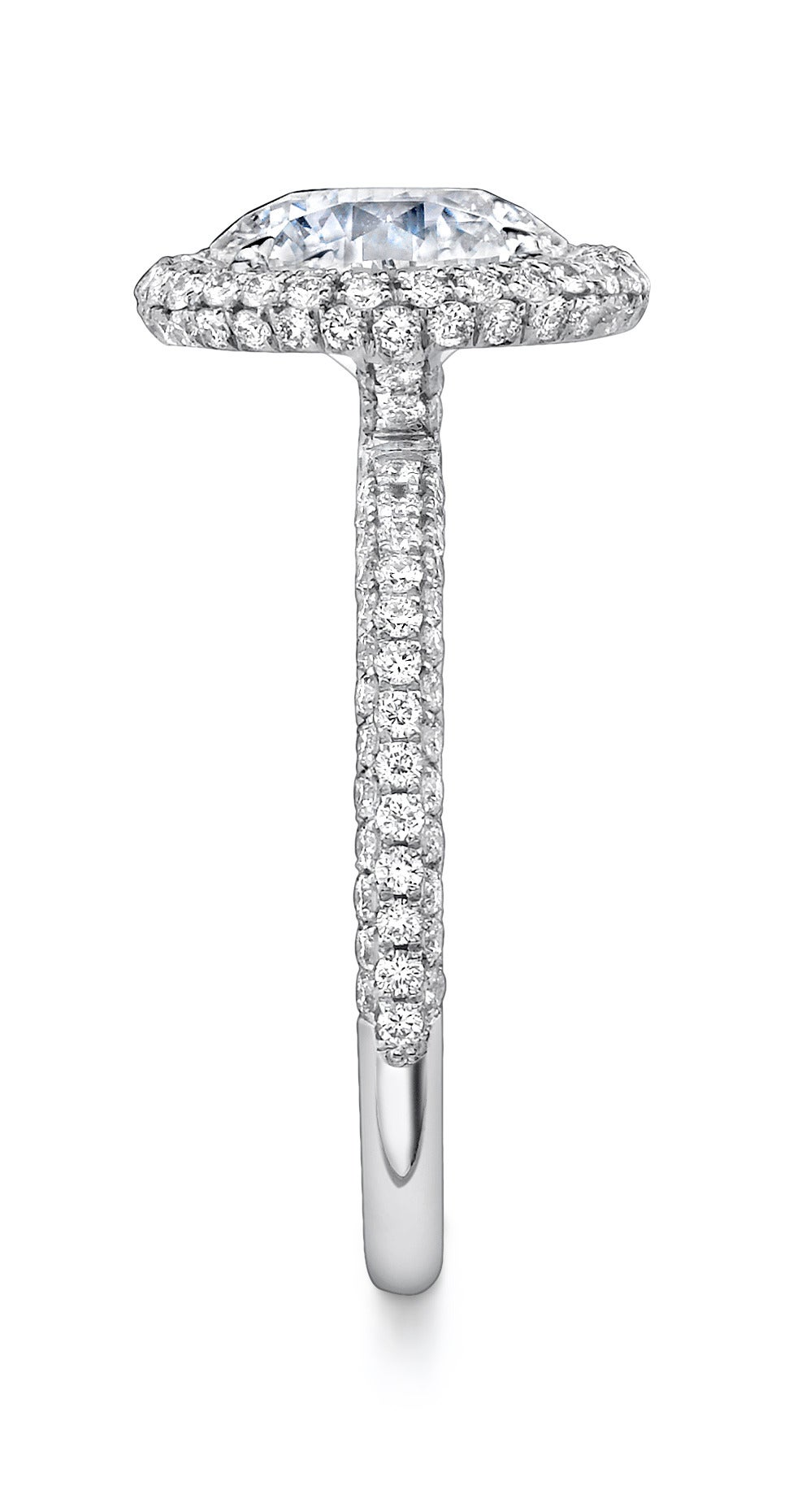 Platinum "Tri Halo" Ring with a Round Brilliant Center Stone Suspended by a Triple Row of Micro Pave Ideal Cut Diamonds.  Ideal Cut Diamond Qualtiy F/VS2 with a Total Weight of 1.07CT. 

Throughout history, the halo has symbolized