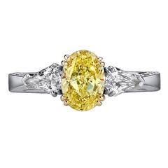 Fancy Oval GIA Cert Yellow Diamond Platinum Ring