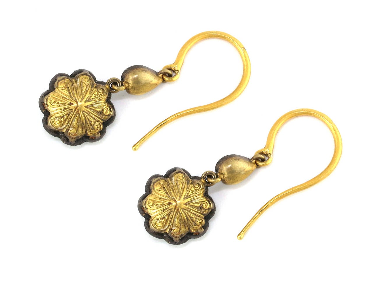 18 Karat Yellow Gold Dangle Earrings with 1.08 CT Rose Cut Diamonds, accented with an Antique Silver Patina Finish. These earrings hang at about 1.25 inches in length and are 0.5 inches wide. 

Inspired by the Edwardian Era, a time when fine