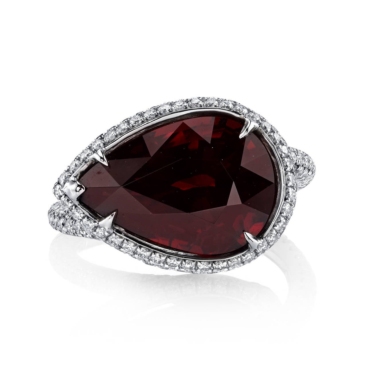 Sensual and sleek, this ring features a stunning pear-shaped Theodolite Garnet that instantly captures your attention. 

The Ancient Egyptians frequently adorned themselves with crowns dazzled with garnet. It was considered to be the single most