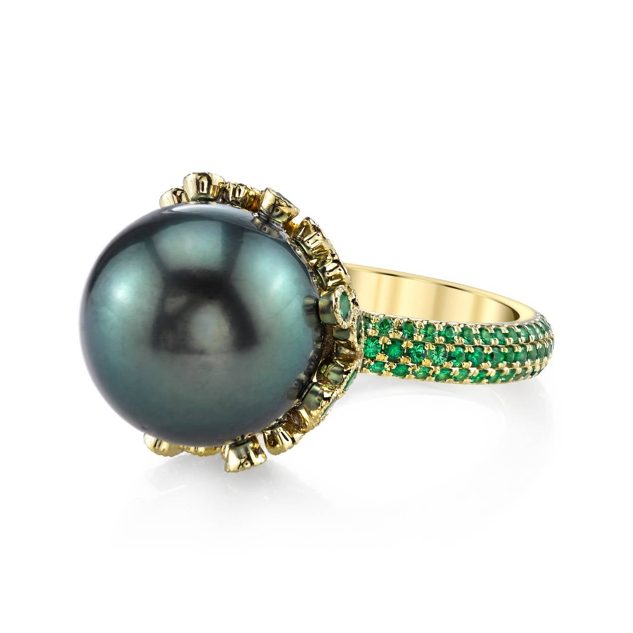 This stunning ring features a 15mm Tahitian Pearl that has been hand-selected for its natural shape and iridescent color. 

Due to their naturally dark color, Tahitian pearls have become some of the most sought after, expensive pearls in the