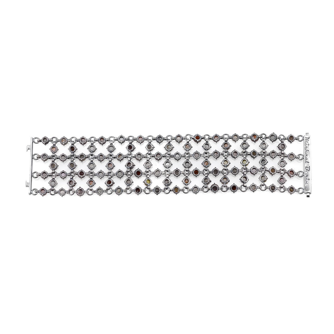 This beautiful bracelet has both modern and traditional elements. Earthy rustic diamonds, a trendy twist on neutrals, pair wonderfully with the muted tones of Organic Silver. The hand-engraved design on the Organic Silver clasp does not go unnoticed