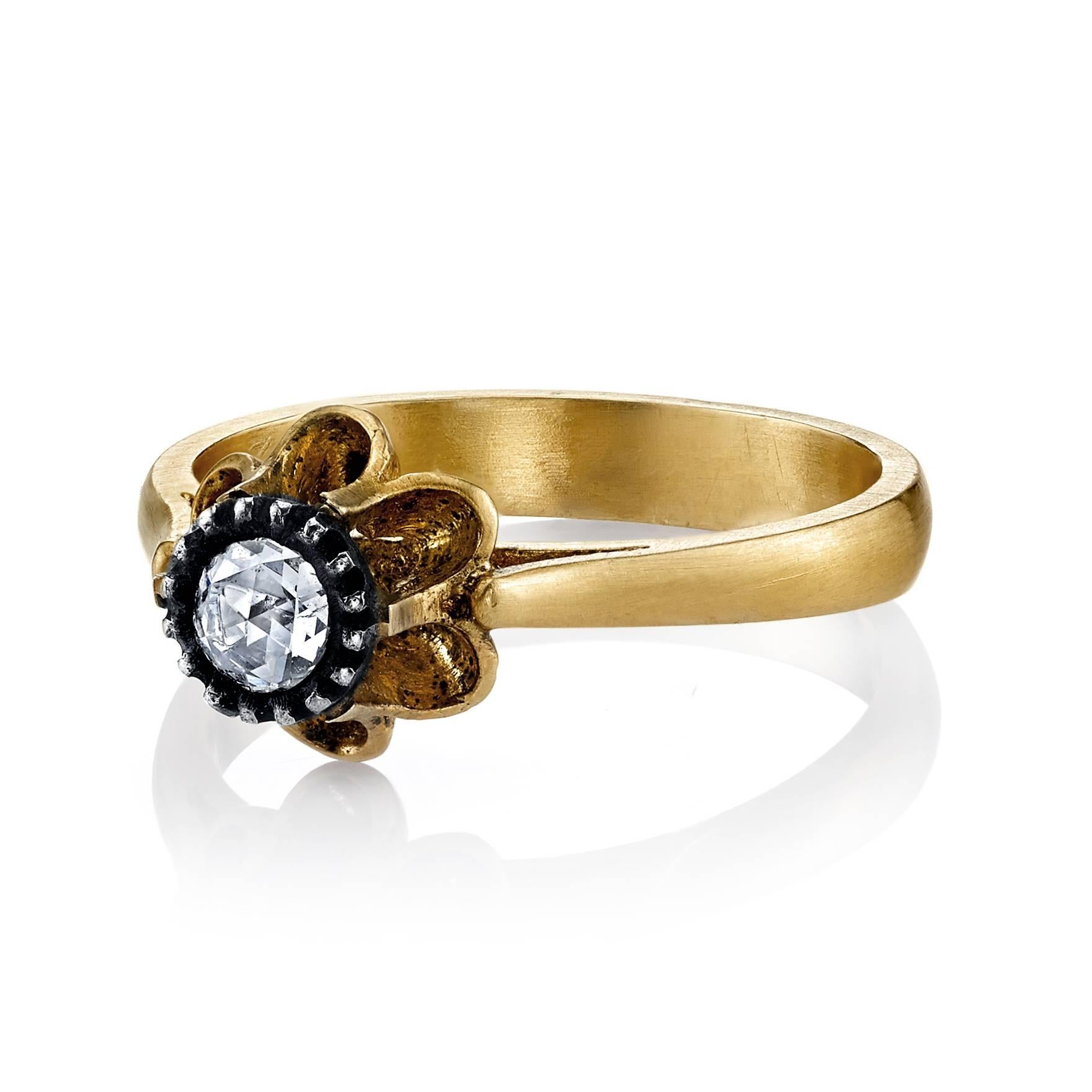 18 Karat Yellow Gold and 0.17 CT Rose Cut Diamond Ring, accented with Silver Patina. 

Inspired by the Edwardian Era, a time when fine jewelry was a crucial component of every outfit, pieces were created to compliment the silk and lace worn by