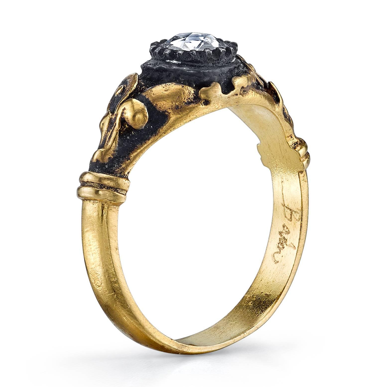 18 Karat Yellow Gold and 0.22 CT Rose Cut Diamond Ring, accented with Silver Patina. 

Inspired by the Edwardian Era, a time when fine jewelry was a crucial component of every outfit, pieces were created to compliment the silk and lace worn by