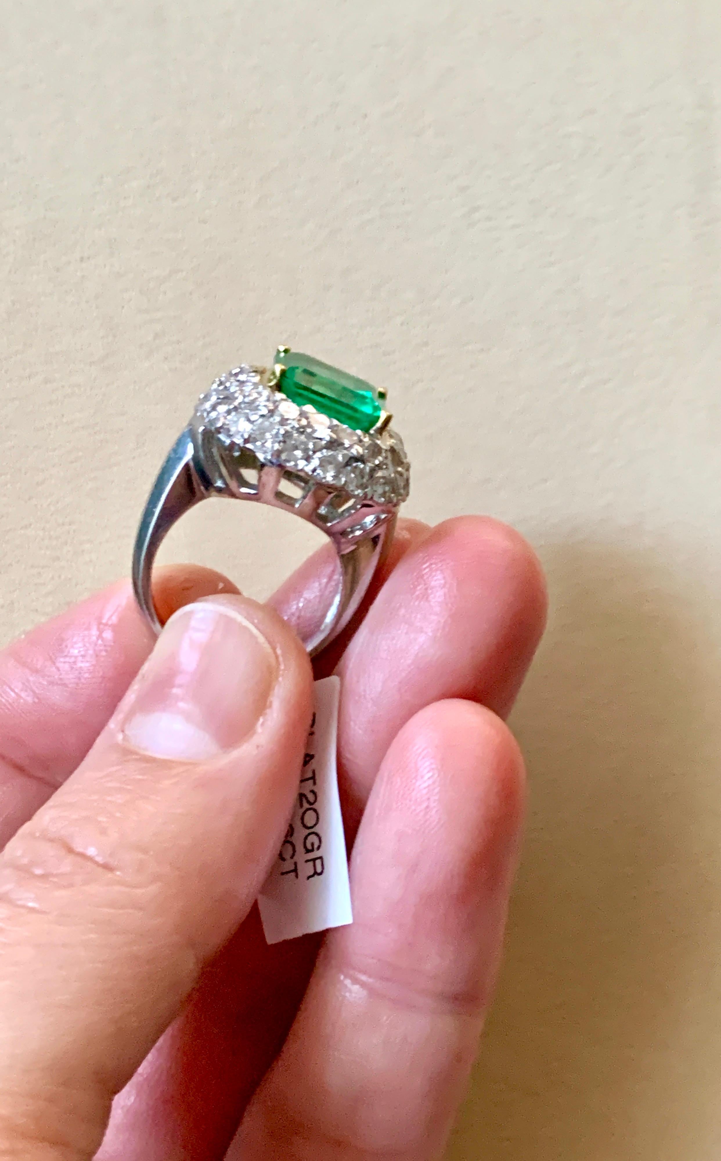 6 Carat Emerald Cut Colombian Emerald and 4 Carat Diamond Ring Platinum Two-Tone 9