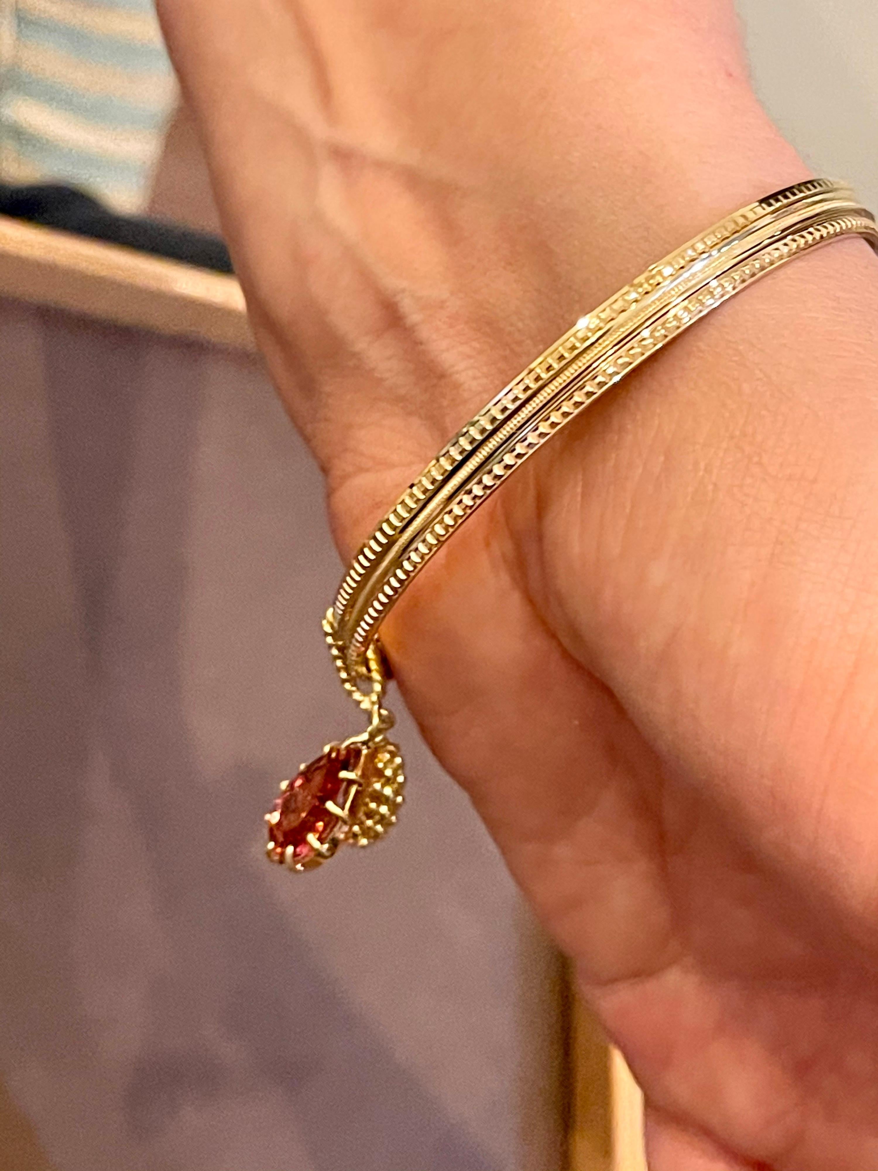 Magnificent Three Yellow Gold Bangle Attached by Pink Tourmaline and Gold Charm 10