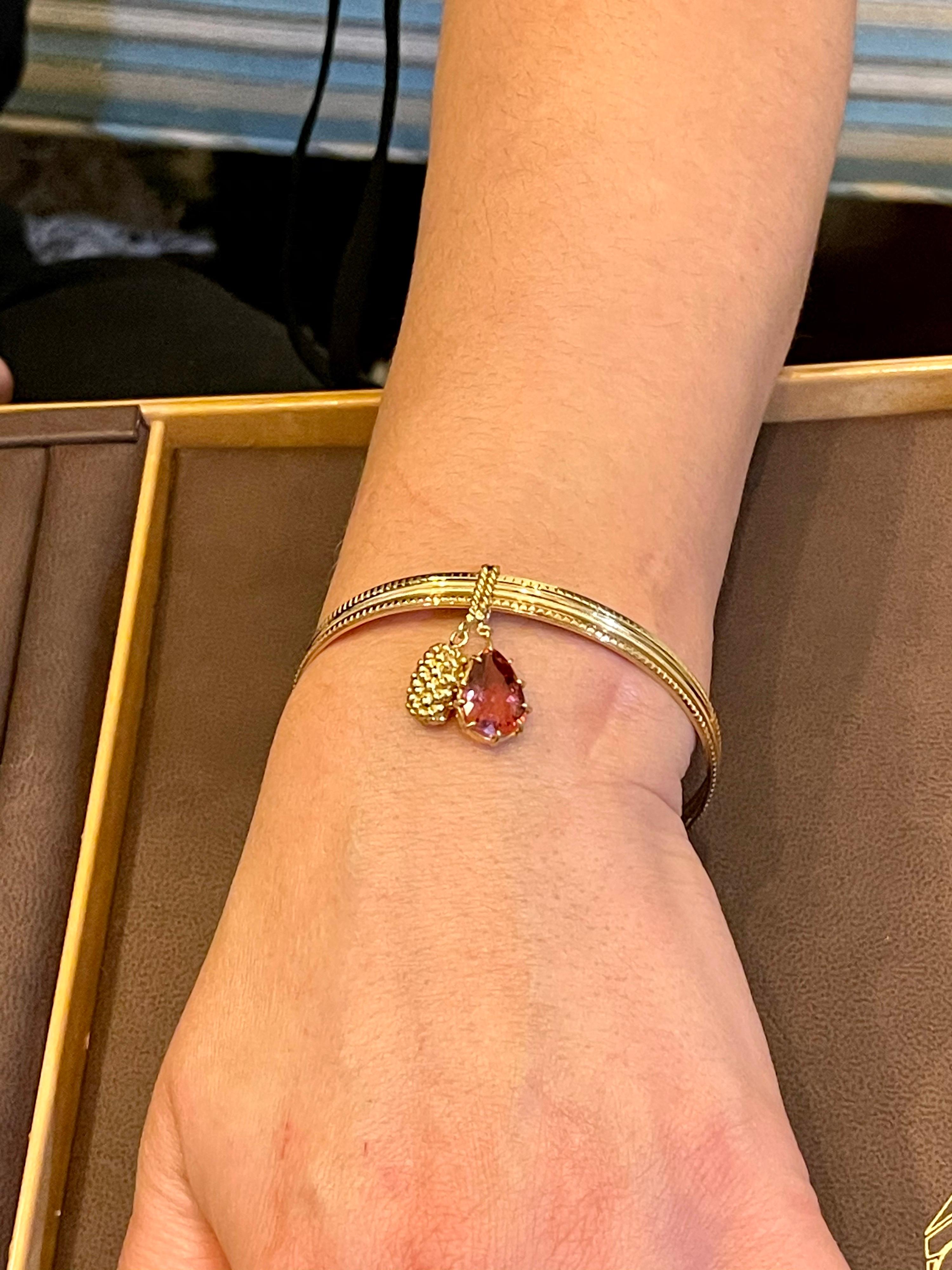 Magnificent Three Yellow Gold Bangle Attached by Pink Tourmaline and Gold Charm 13