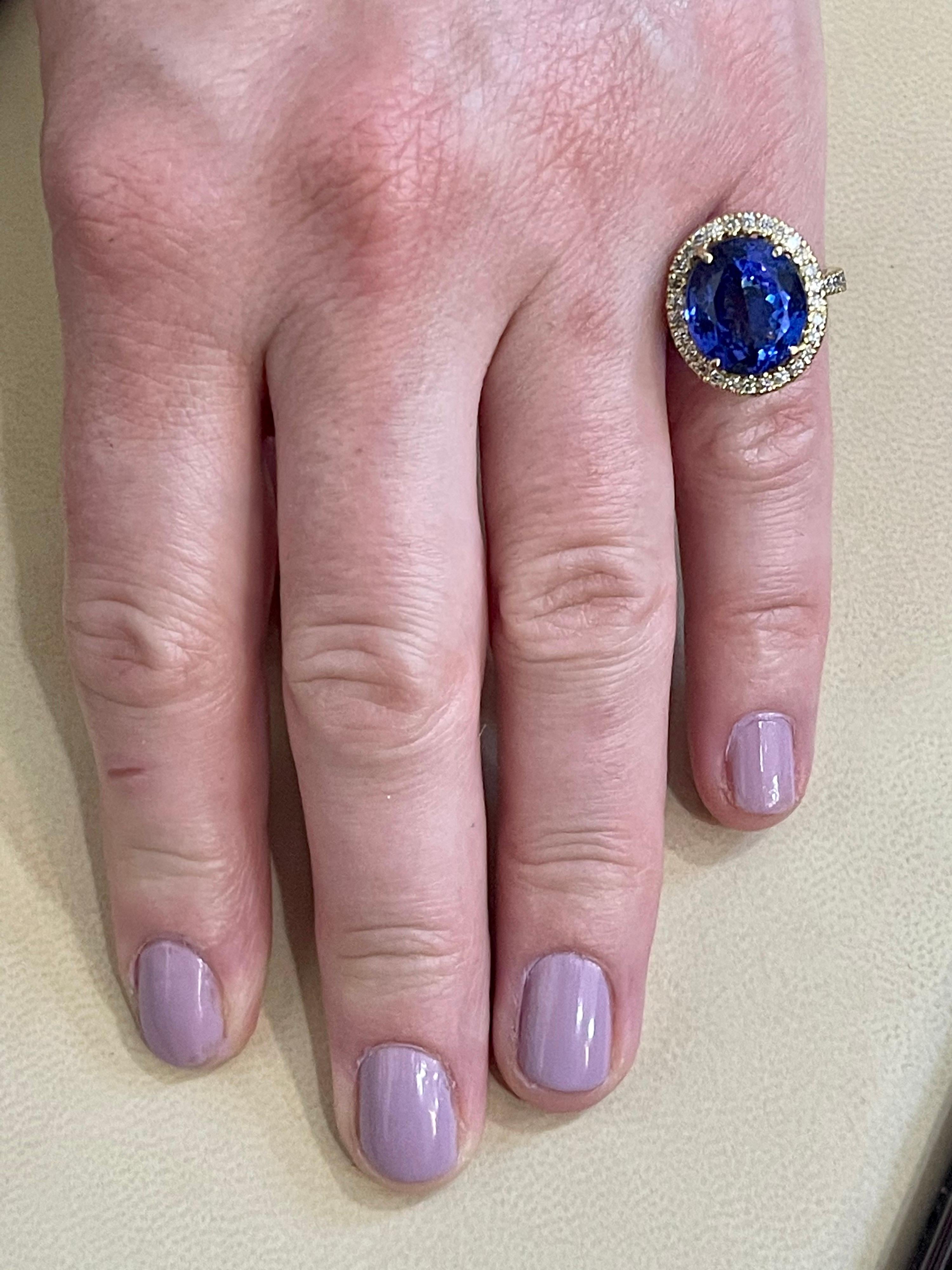 8.2 Carat Oval Tanzanite and 1.2 Carat Diamond Ring 18 Karat Yellow Gold 1