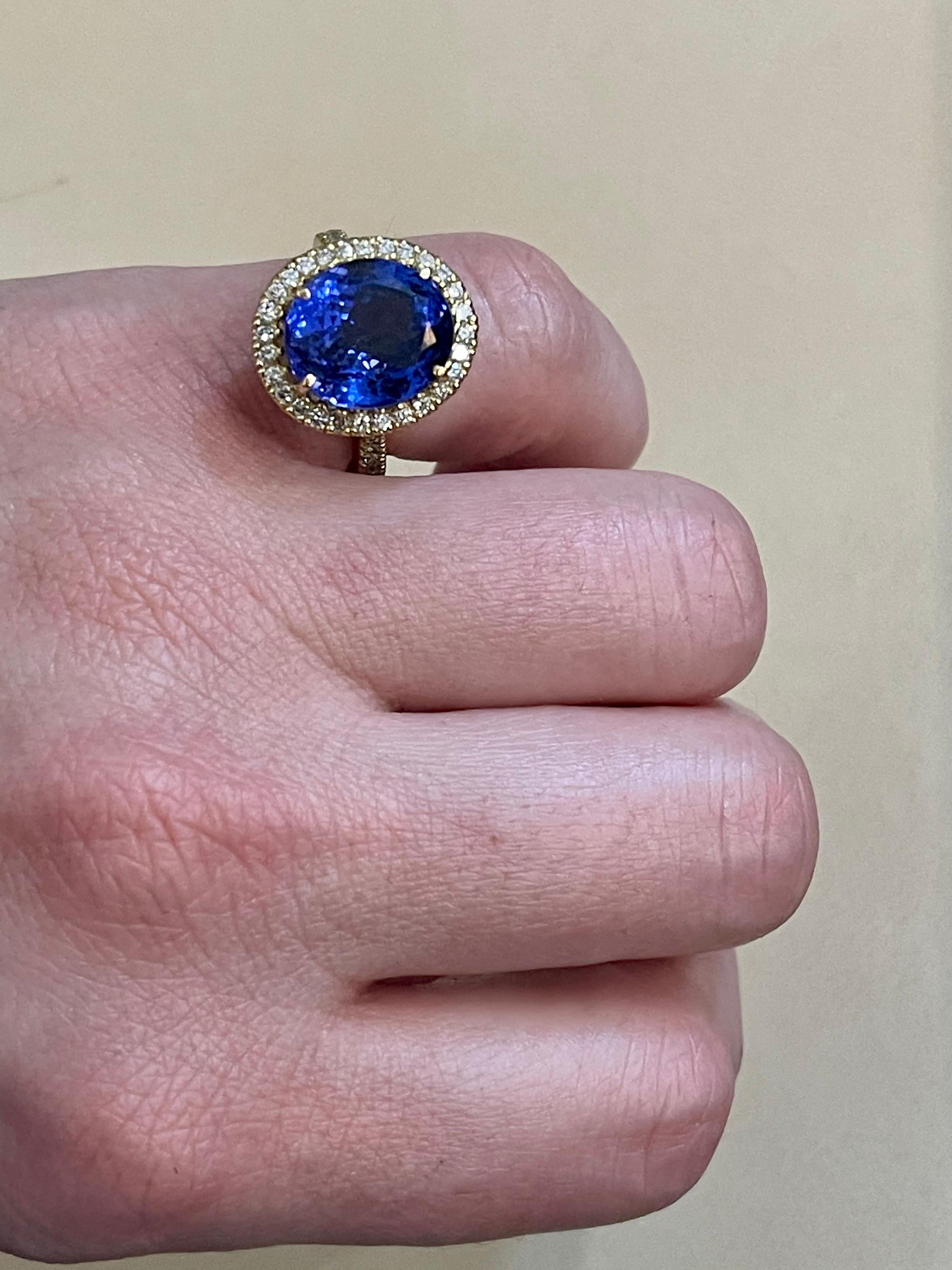 8.2 Carat Oval Tanzanite and 1.2 Carat Diamond Ring 18 Karat Yellow Gold 2