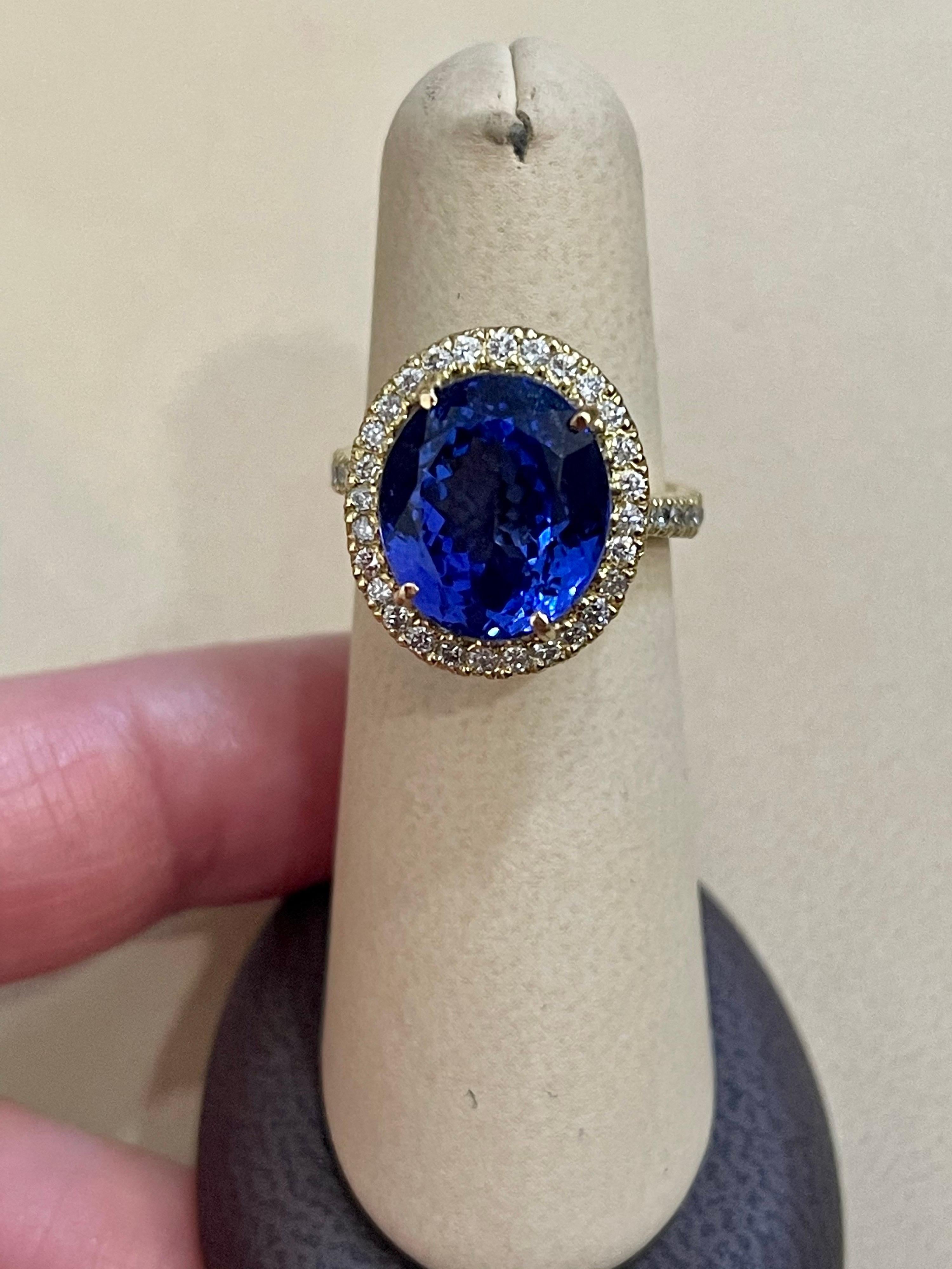 8.2 Carat Oval Tanzanite and 1.2 Carat Diamond Ring 18 Karat Yellow Gold 3