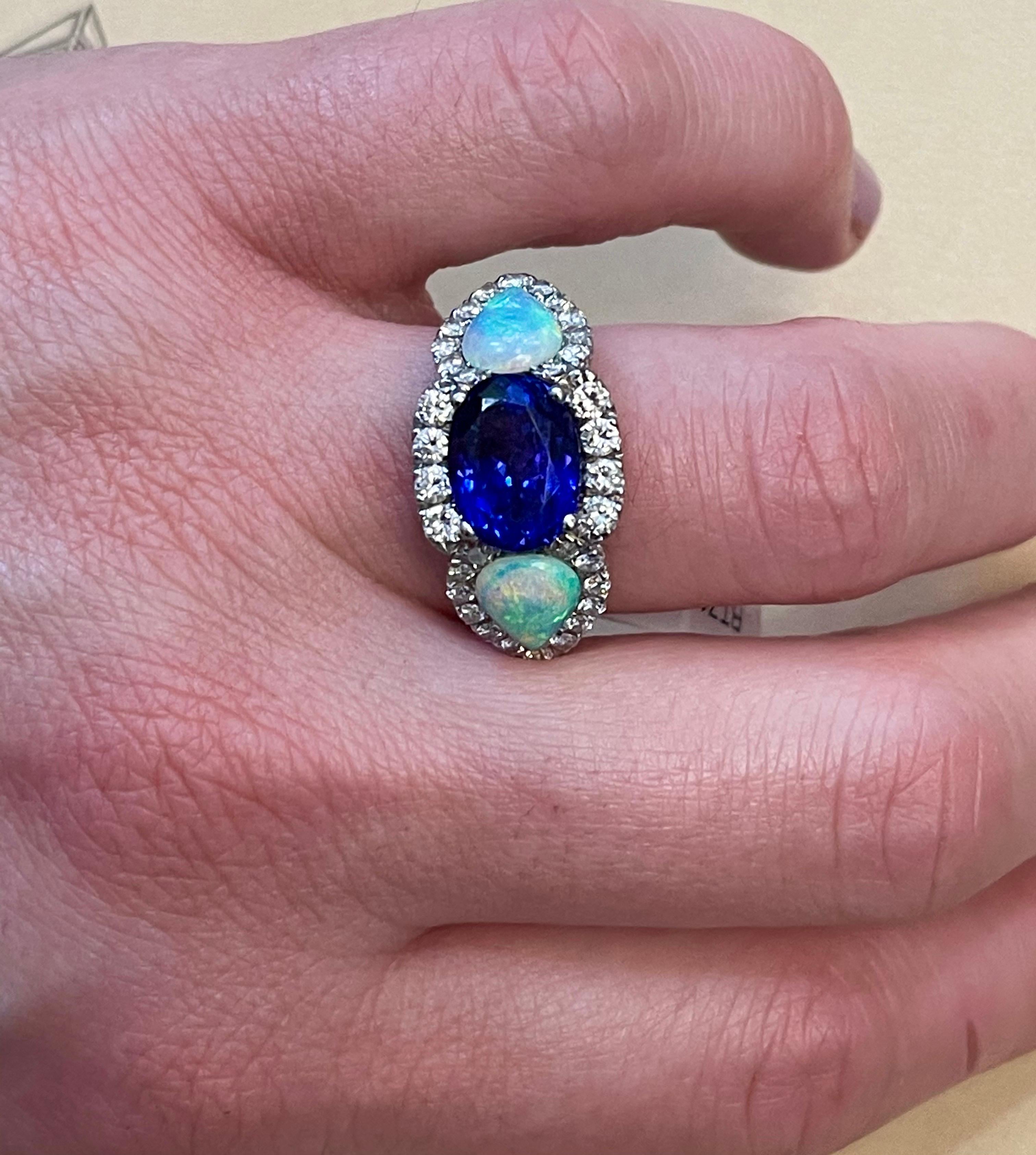 5 Carat Oval Tanzanite, Diamond and Opal Ring 14 Karat White Gold, Estate For Sale 2