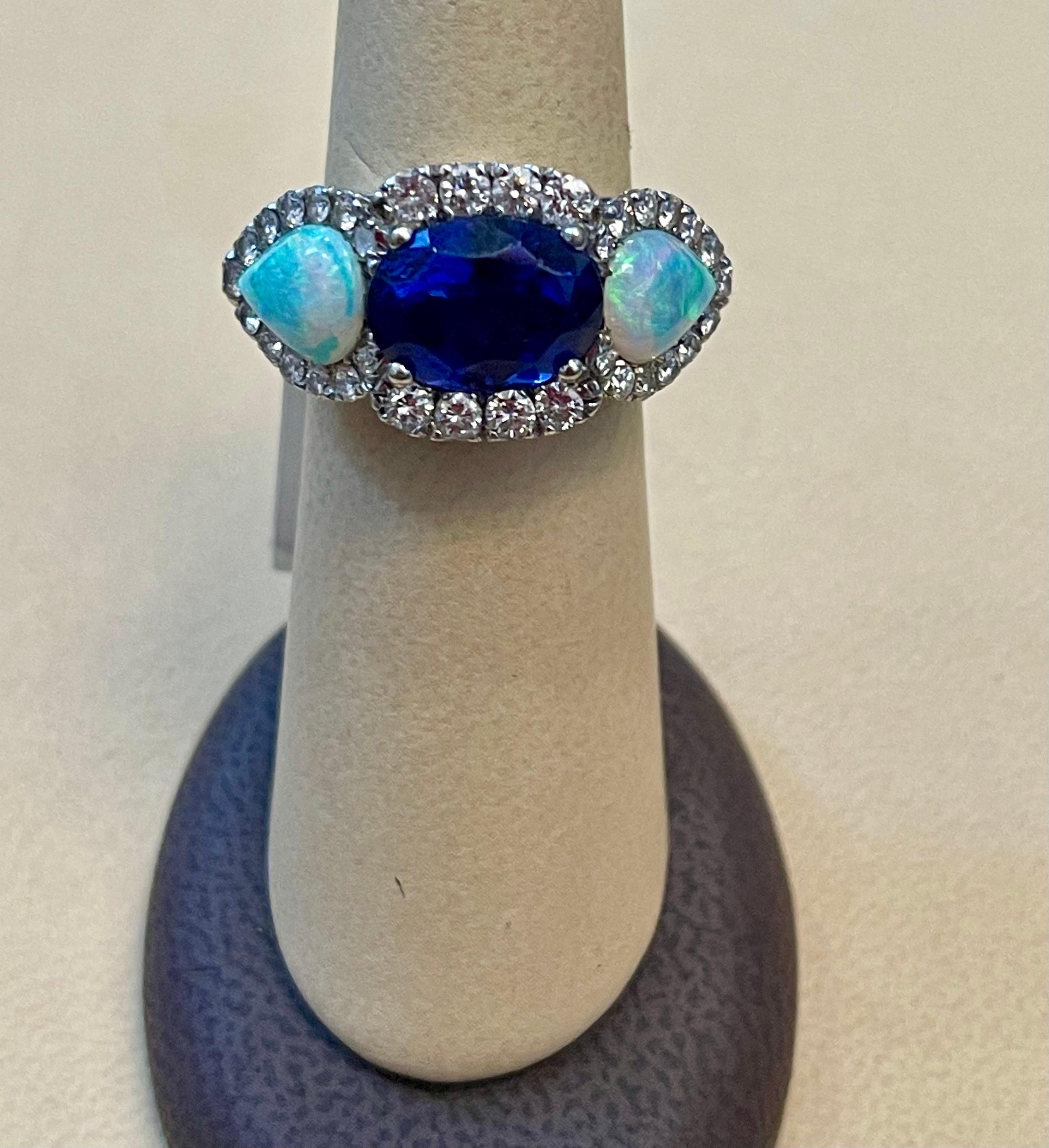 5 Carat Oval Tanzanite, Diamond and Opal Ring 14 Karat White Gold, Estate For Sale 1