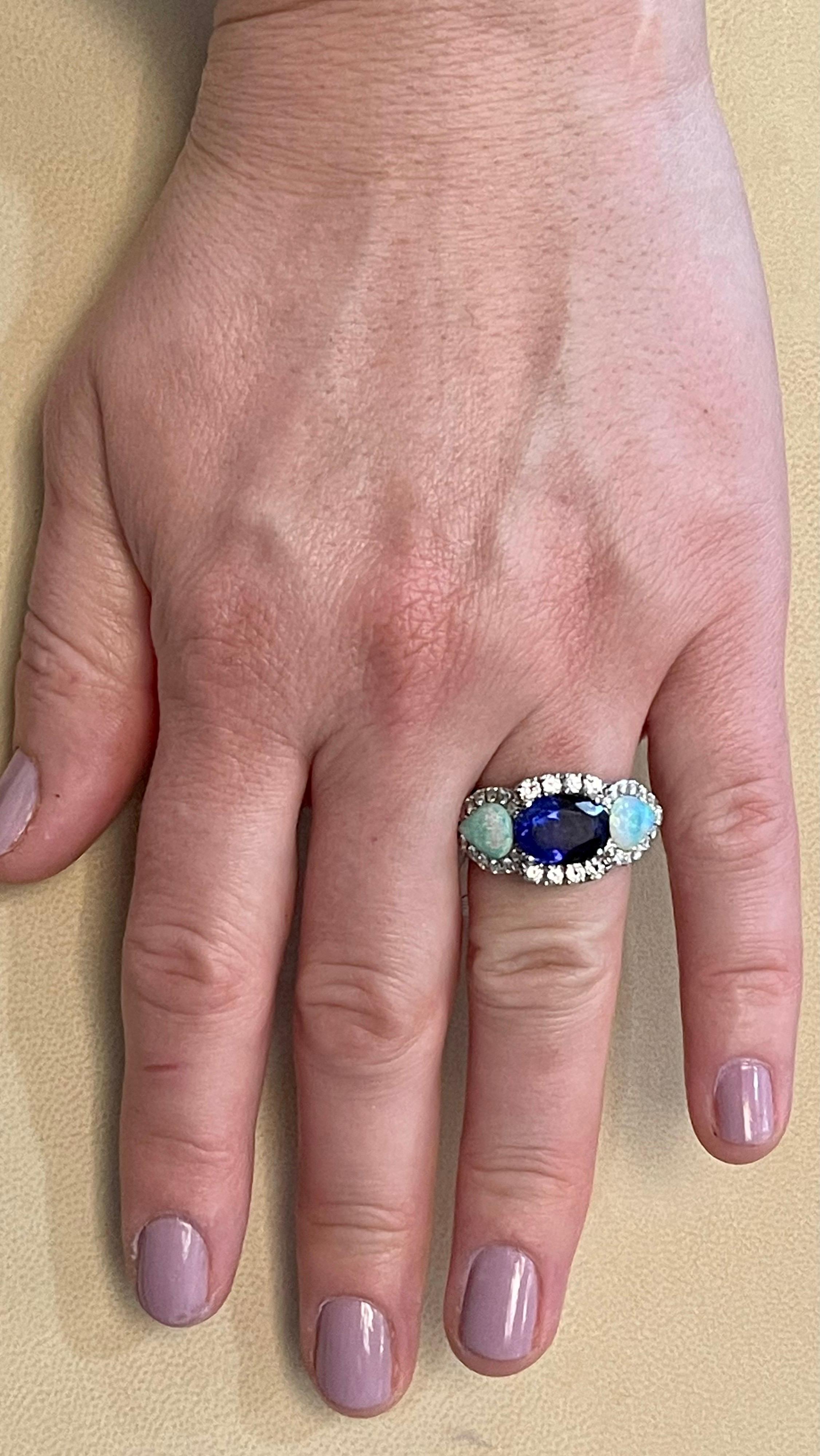 Bague en or blanc 14 carats avec tanzanite ovale de 5 carats, diamant et opale, ancienne propriété en vente 7