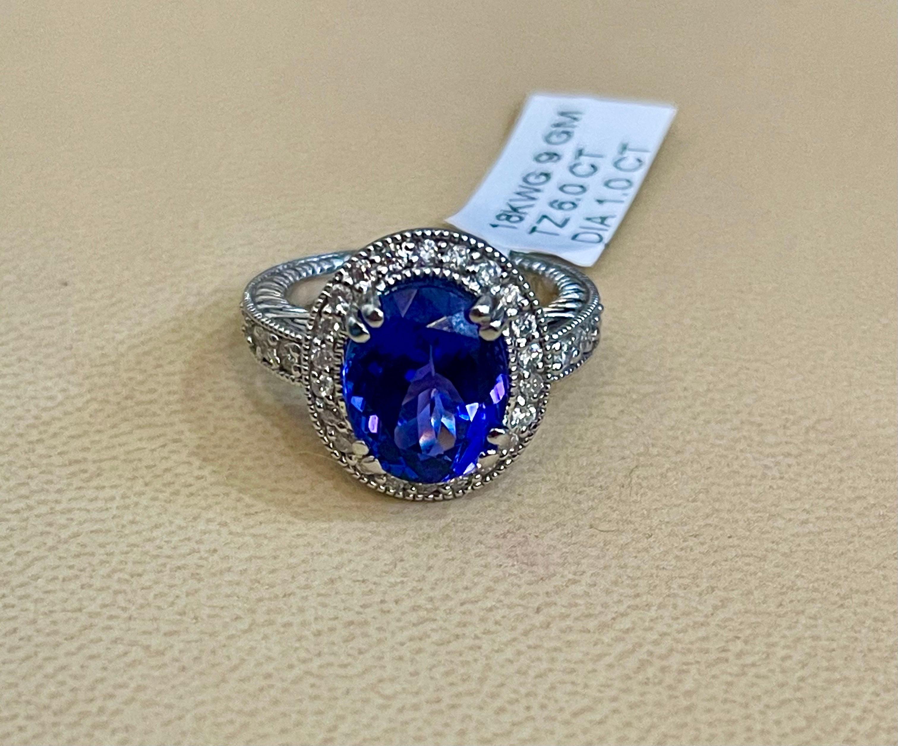 6 Carat Oval Tanzanite and 1 Carat Diamond Ring 14 Karat White Gold, Estate In Excellent Condition For Sale In New York, NY