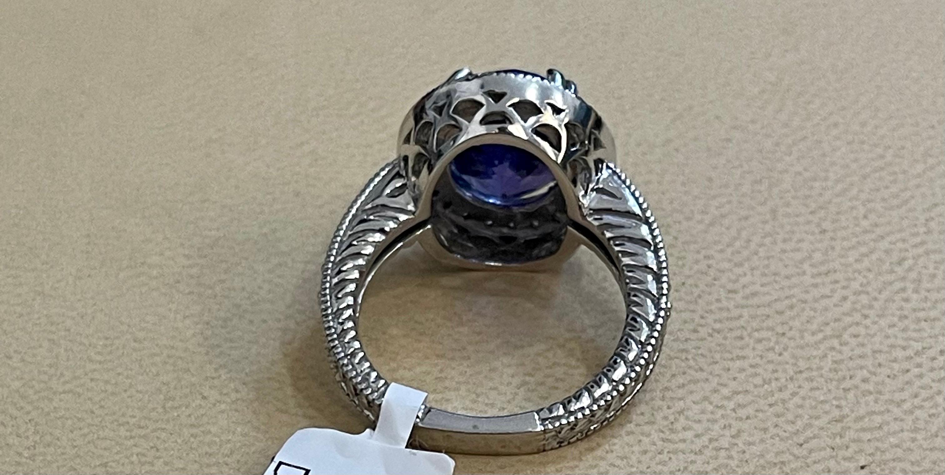 Women's or Men's 6 Carat Oval Tanzanite and 1 Carat Diamond Ring 14 Karat White Gold, Estate For Sale