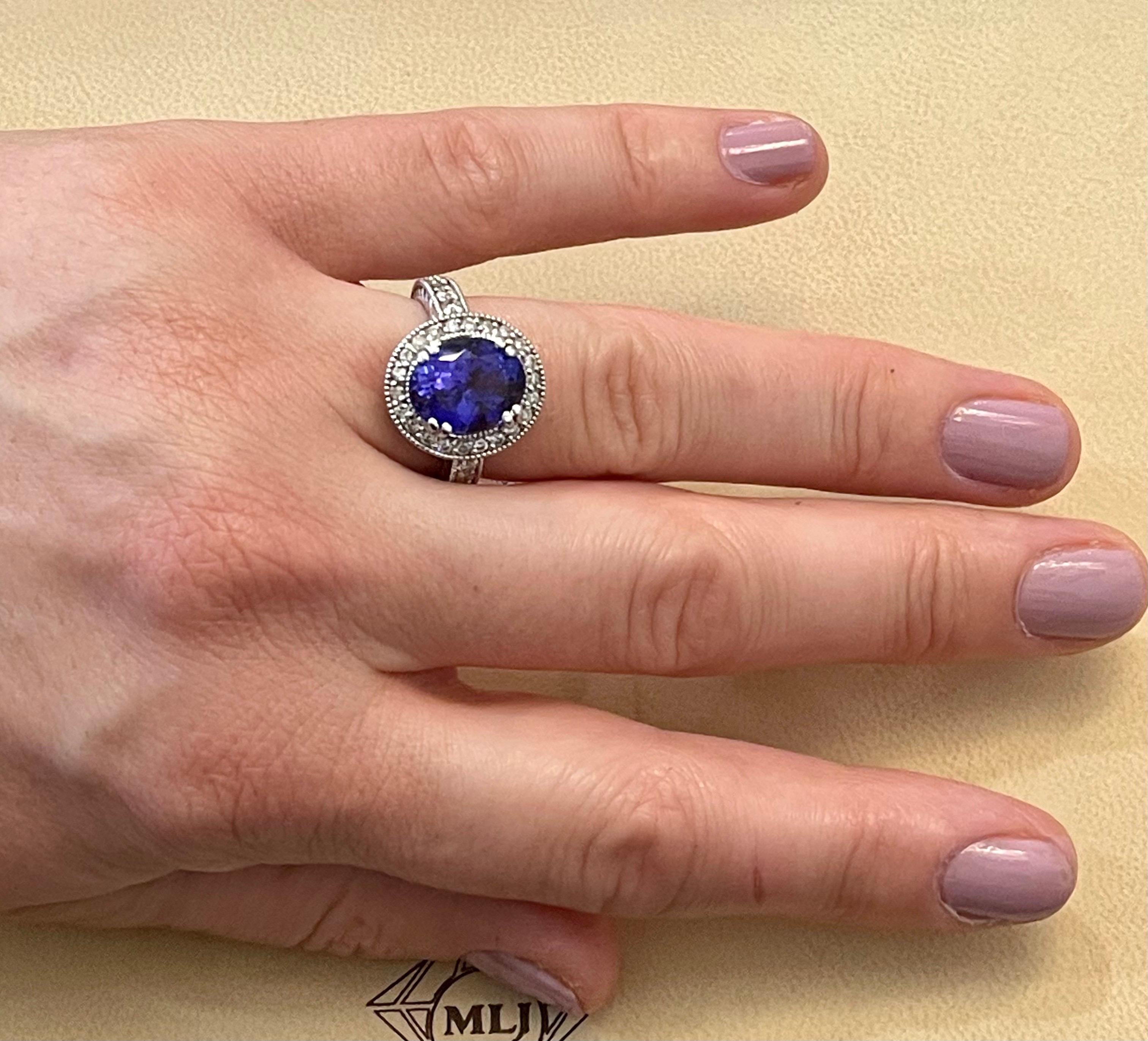 6 Carat Oval Tanzanite and 1 Carat Diamond Ring 14 Karat White Gold, Estate For Sale 5