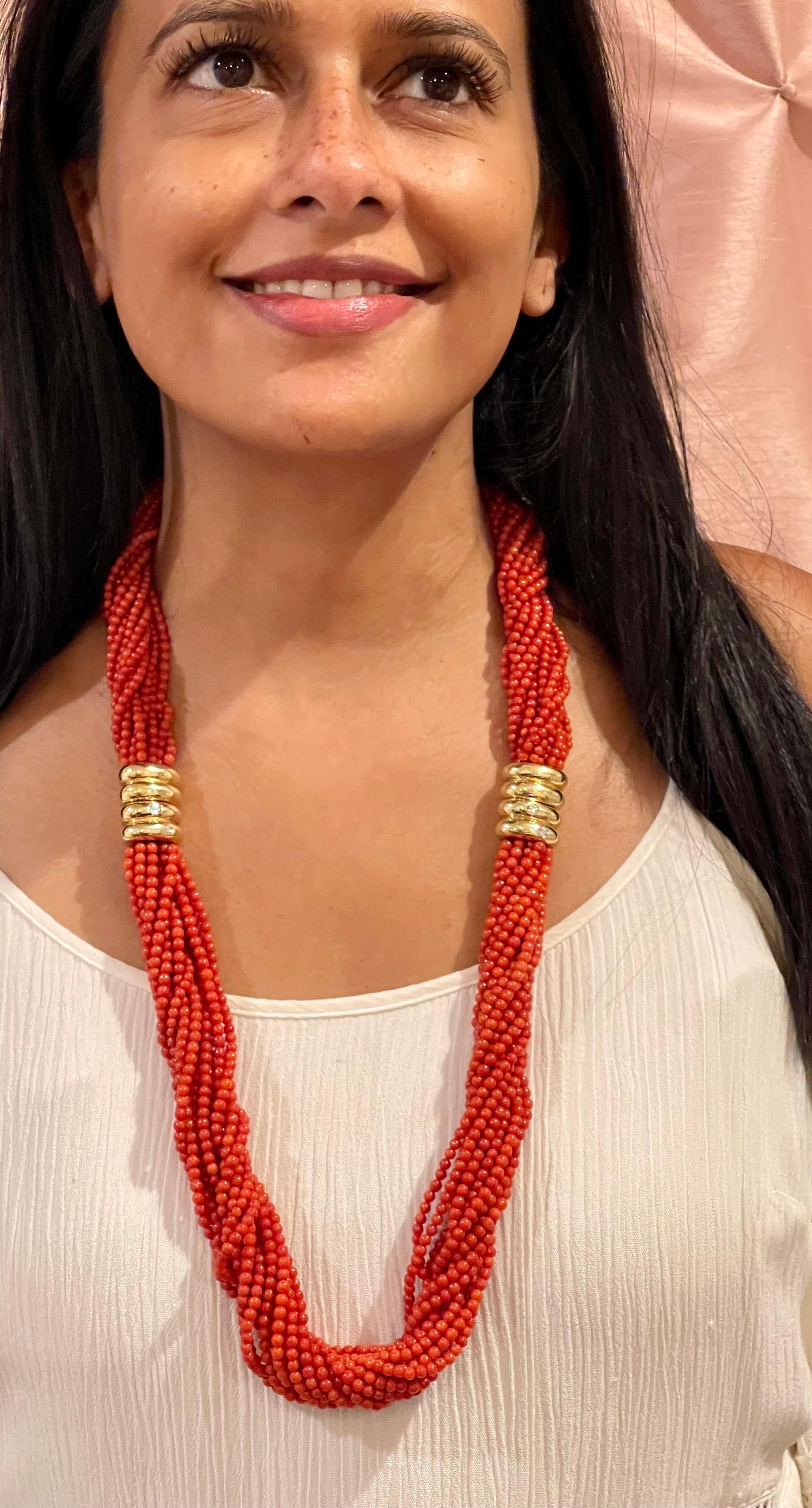 Vintage Natural Coral 3.5 to 4mm Multi Layer 16 Strand 1080 CT Bead Necklace 18 KY Gold, 33-34 Inch long
A vintage piece.
There are two necklaces of 16.5-17 inch long which can be clasped together for a long necklace of 33-34 inch long and both gold
