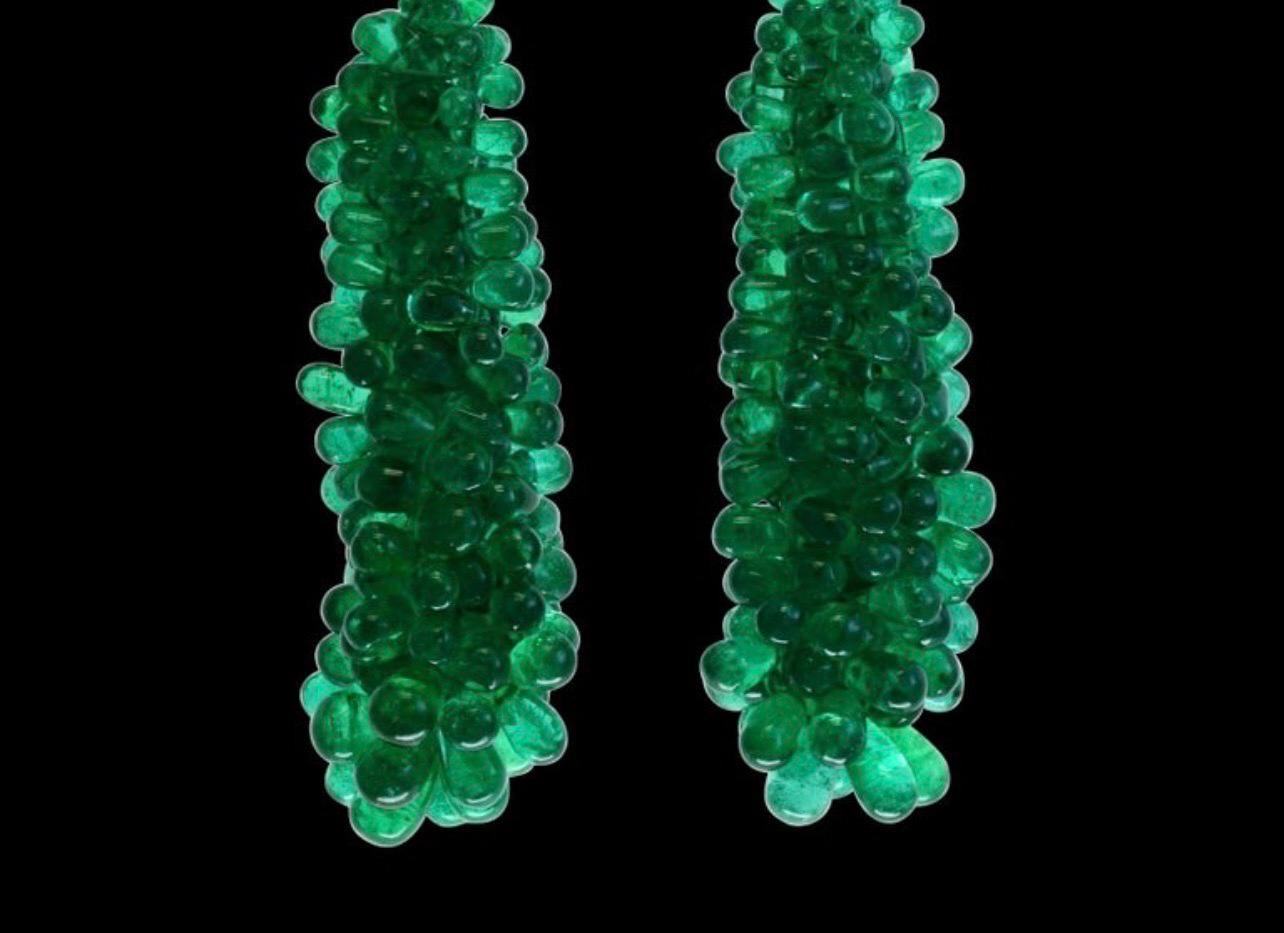 green hanging earrings