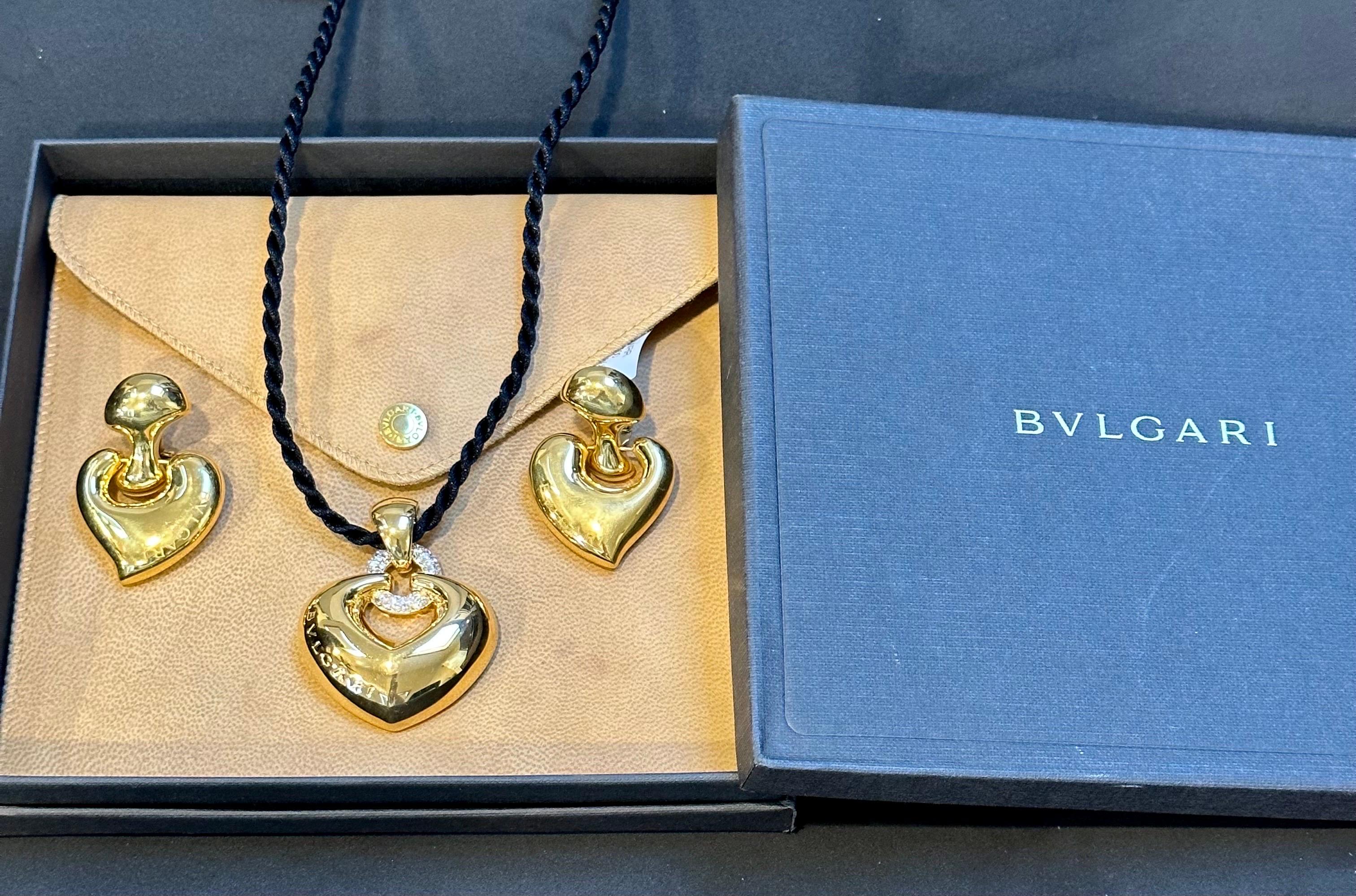 Bulgari 'Doppio Cuore' Gold- und Diamant-Anhänger mit Herzanhänger an der Lederkordel 11