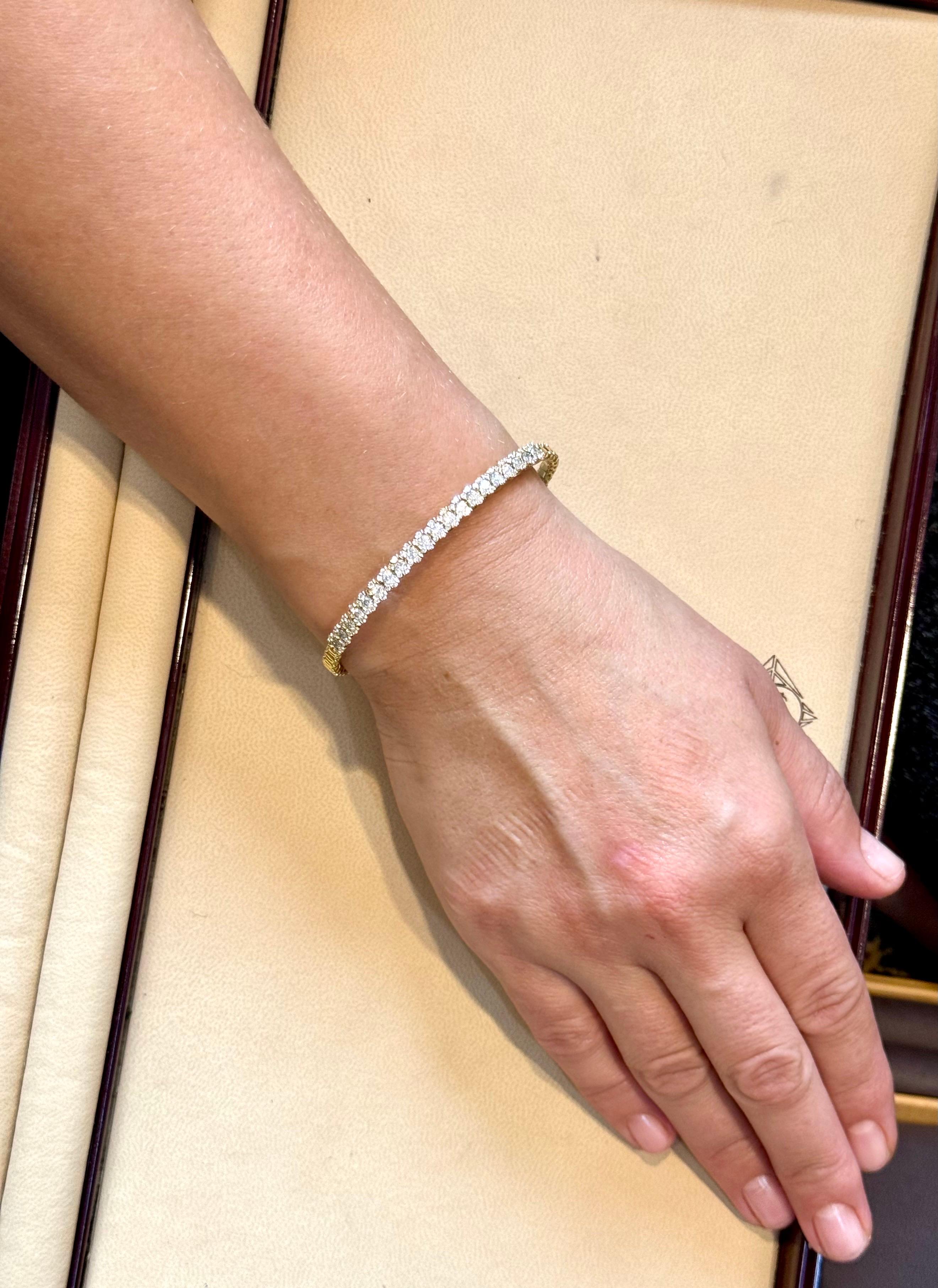 Diamants de 2 carats  Bracelet jonc en or jaune 18 carats 20 grammes, signé SGJ en vente 5