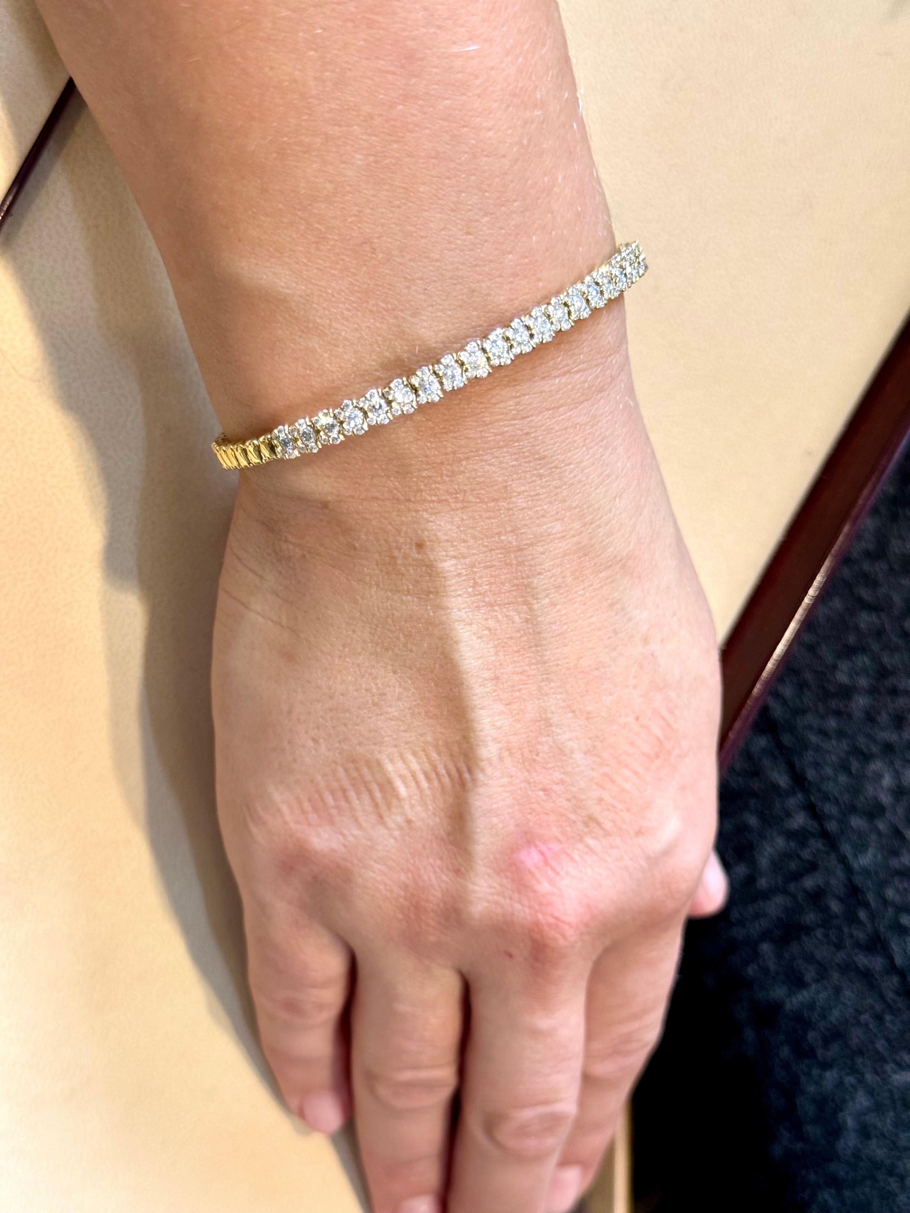 Diamants de 2 carats  Bracelet jonc en or jaune 18 carats 20 grammes, signé SGJ en vente 7