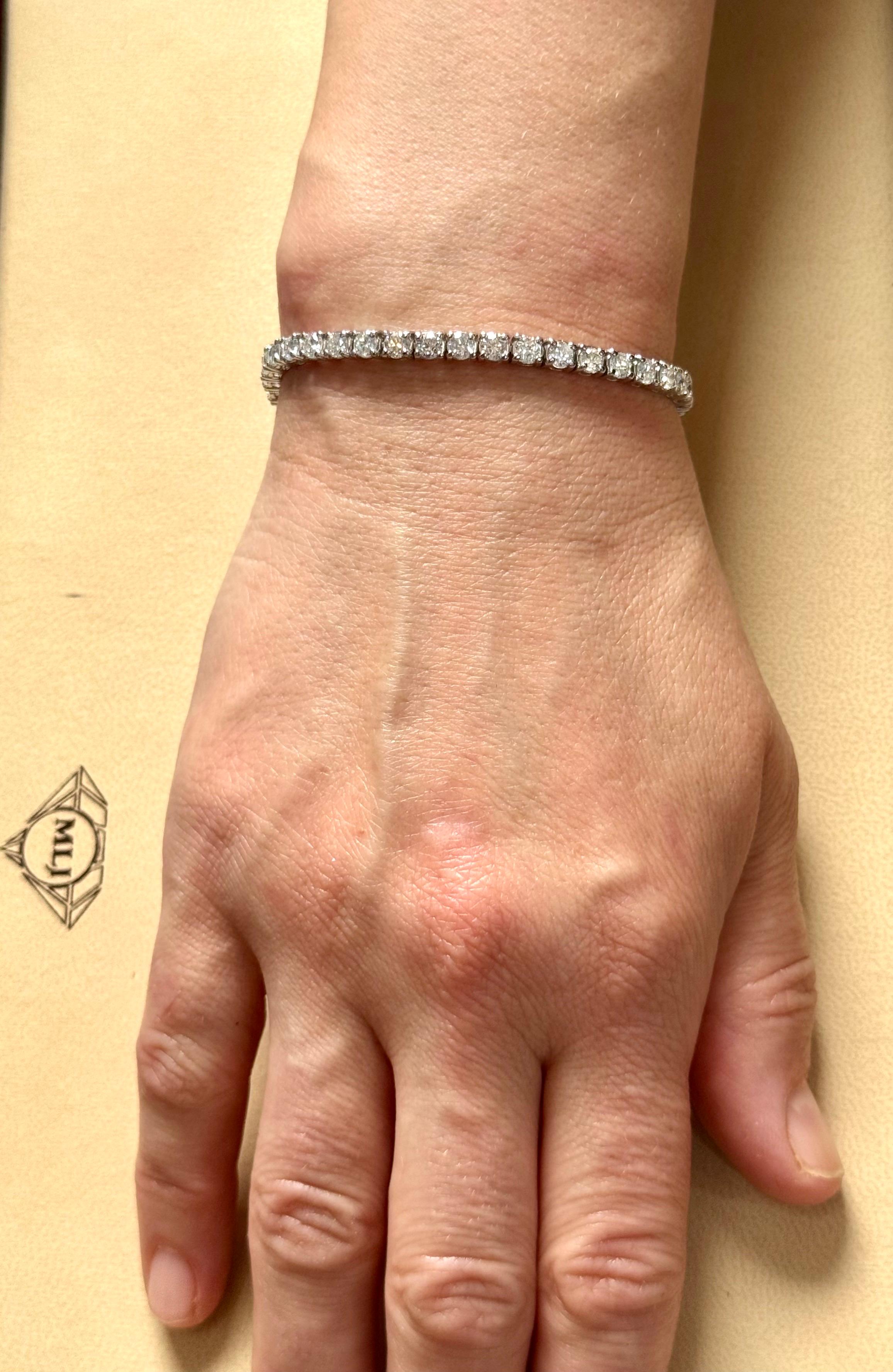 Bracelet tennis de 34 diamants ronds et 35 pointes chacun en or 14 carats 11,9 carats 7 