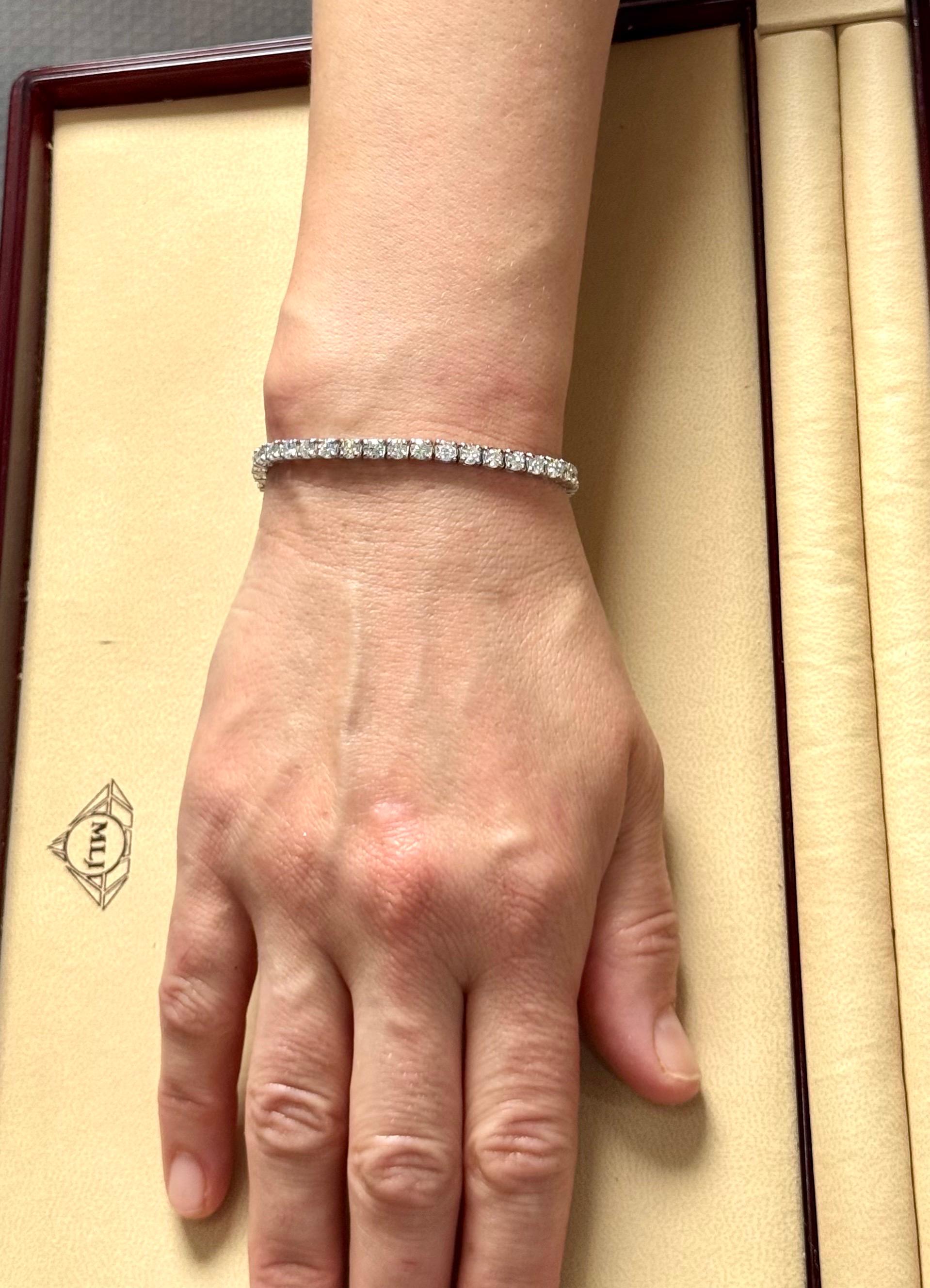 Bracelet tennis de 34 diamants ronds et 35 pointes chacun en or 14 carats 11,9 carats 7 