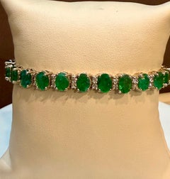 21 Carat Emerald 1.6 Carat Diamond Tennis Bracelet 14 Karat White Gold