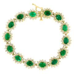 12 Carat Oval Cut Emerald and Diamond Tennis Bracelet 14 Karat Yellow Gold 23.5G