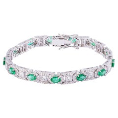 Bracelet tennis en émeraudes naturelles de Zambie avec diamants et or 18 carats