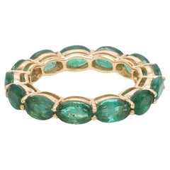 Natural Zambian emerald band ring in 18k gold