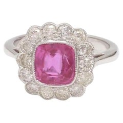 Anello con zaffiro rosa naturale e diamante in oro 18 carati