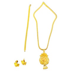 30.8 Gm 22 Karat Yellow Gold Earring , Bracelet 
Chain + Pendant Bridal Suite