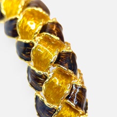 Set di bracciali e orecchini Piaget d'epoca, oro giallo 18 carati e smalto