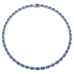 Collier en or 18 carats avec saphir bleu de 30,12 carats et diamants de 0,93 carat