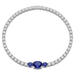 Bracelet en or jaune 18 carats serti d'un diamant de 1,43 ct et d'un saphir bleu de 1,55 ct