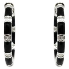 Boucles d'oreilles clous en or 18 carats serties d'un diamant de 0,74 carat, une élégance intemporelle