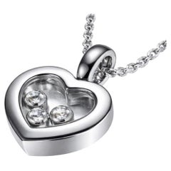 Collana Chopard con ciondolo a forma di cuore “Floating Happy Diamonds Icons”, in oro bianco 18 carati (KWG), con certificato