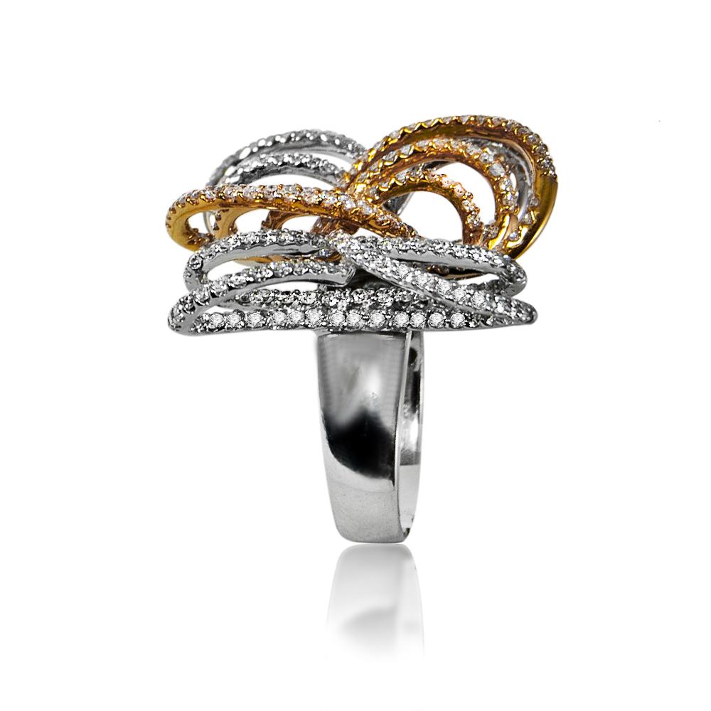 Unique and exquisite ring inspired by beauty of butterflies in nature set with 3.30 carats of white diamonds in two tone white and yellow 18 karat gold . It is in size 7 and if needed it can be resized.