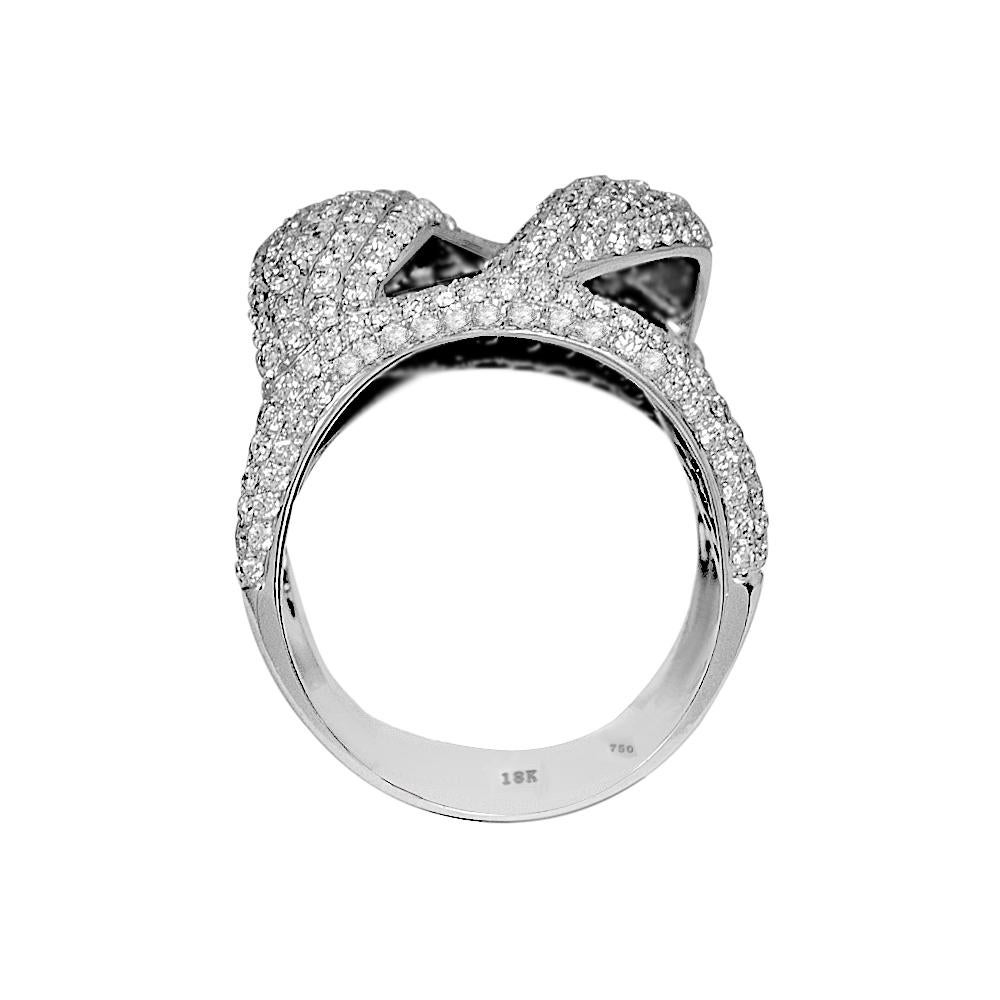 This unique and fantastic stylish ring beautifully created in 18 karat white gold with 1.85 carats of white diamonds over background of 1.45 carats of exotic black diamonds.
This ring is available in stock. It is in size 7 and if needed it can be