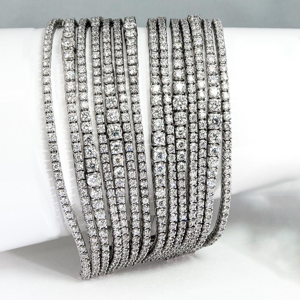 The most magnificent tennis bracelet of all, features 14 rows of dazzling gradual sizes of brilliant diamonds with total weight of 40.50 carats of SI1 clarity and G-H color, beautifully prong set in 18 karat white gold.