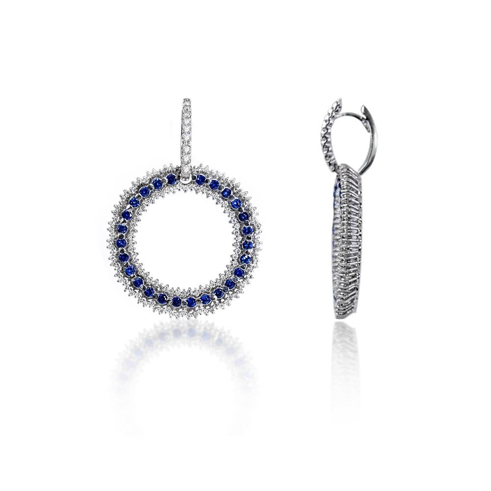 Beautiful sapphire & diamond drop hoops earrings. The sapphire & diamond hoops are separable,  for new look you can wear the diamond hoops only, also you can wear the sapphire hoop as a necklace by adding a chain to it. These elegant and chic