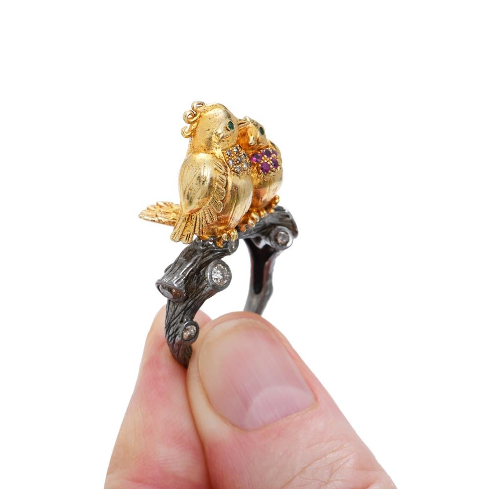 Limited edition 925/1000 patinated silver and vermeil ring by Sylvie Corbelin with two Love Birds on the top of the mount. The top is in vermeil.
Vermeil : 15 Microns
The mount representes a tree branch where champagne diamonds are set.
diamonds