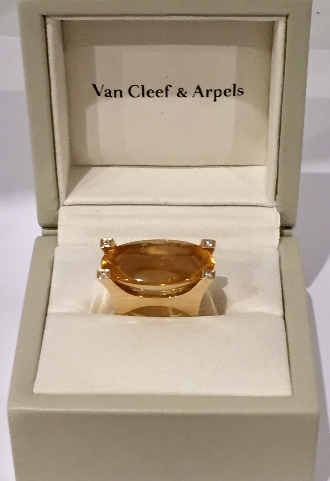 Classic VCA, this is a beautiful Citrine & Diamond retro cocktail ring.  Set elegantly in a modern heavy gold setting. Extremely well made and in beautiful condition. Fully signed and numbered. The bold shape features a monumental honey yellow 